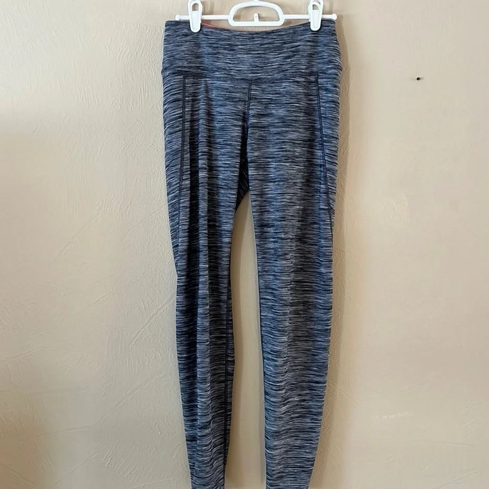 H&M Sport leggings. Gray striped design. Skinny leg size S